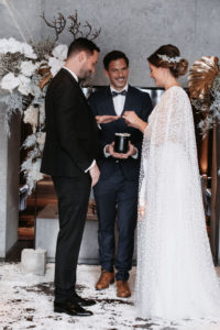 Francois and Melanie exchanging their vows in front of Julien Abegglen Verazzi, their humanist celebrant